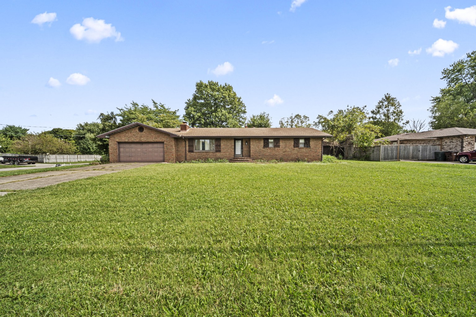 Wide front lawn and exterior view