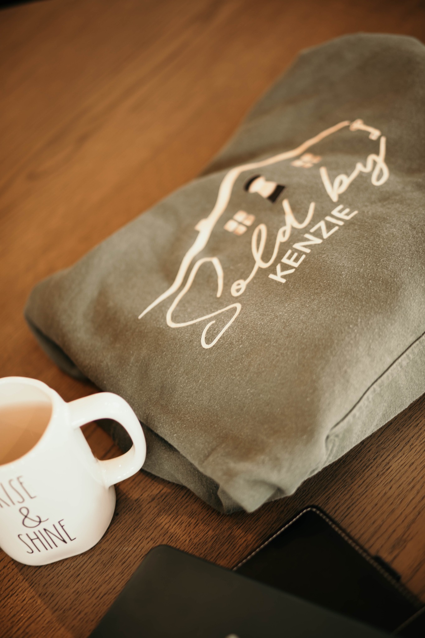 Sold by Kenzie sweatshirt and Rise and Shine mug
